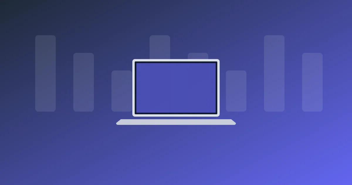 Three business laptops lined up on an office desk